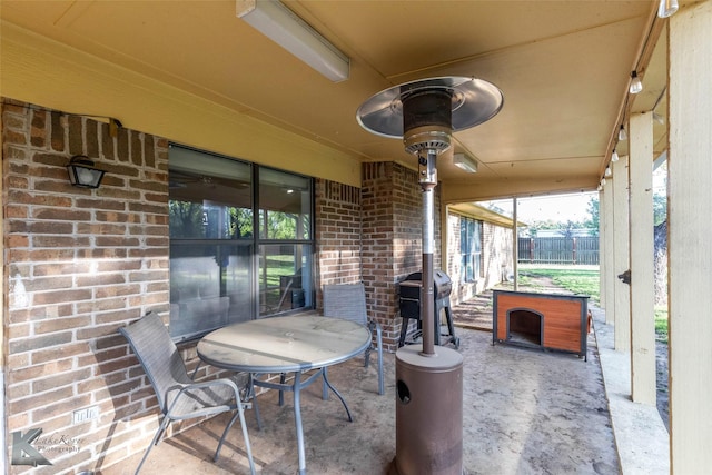 view of patio featuring fence