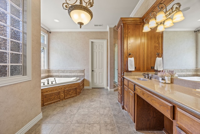 bathroom with a bath, visible vents, vanity, and crown molding