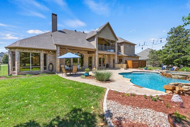view of swimming pool with a lawn, fence, a patio area, and ceiling fan