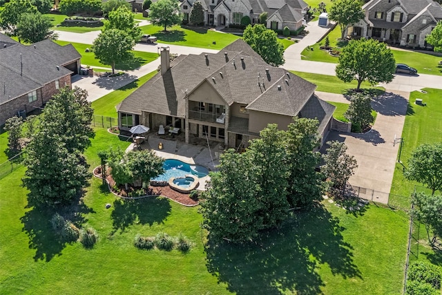 drone / aerial view with a residential view