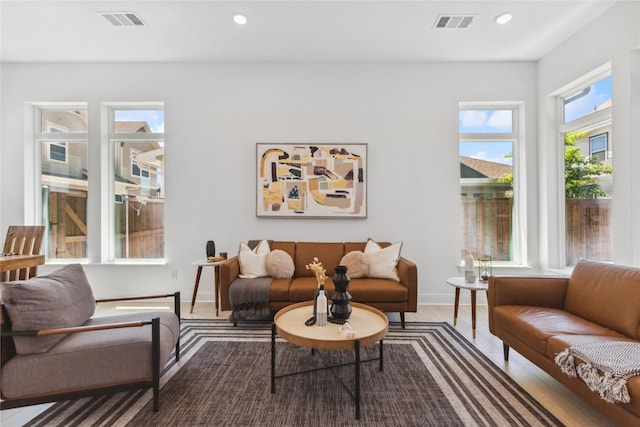 13361 Hedgebrook Pl, Fort Worth, TX 76008 - living room featuring baseboards, recessed lighting, and wood finished floors