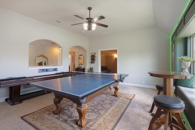 game room featuring arched walkways, visible vents, carpet, baseboards, and a ceiling fan