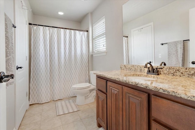 full bath with curtained shower, toilet, vanity, and tile patterned floors
