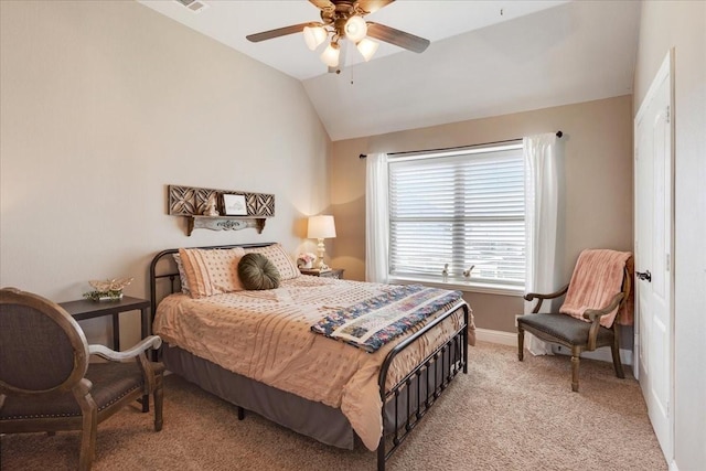 bedroom featuring ceiling fan, light carpet, lofted ceiling, and baseboards