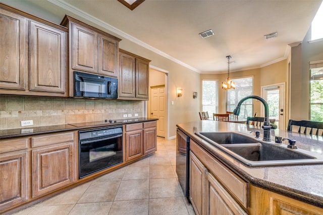 103 Lakehill Ct, Hickory Creek, TX 75065 - kitchen featuring black appliances, a sink, a chandelier, tasteful backsplash, and crown molding