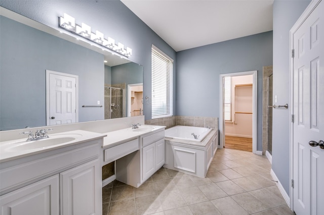 103 Lakehill Ct, Hickory Creek, TX 75065 - full bath with a shower stall, a bath, double vanity, tile patterned flooring, and baseboards
