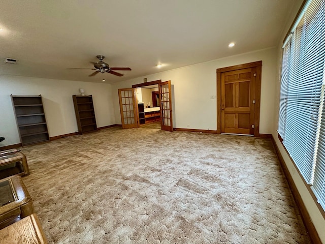 unfurnished living room with recessed lighting, ceiling fan, carpet floors, and baseboards