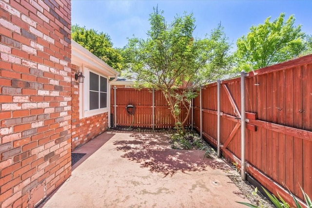 view of patio featuring a fenced backyard