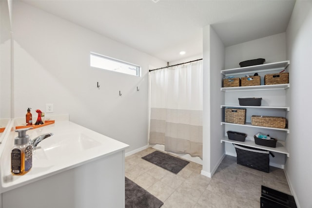 5924 Harvey Gap Ln, Denton, TX 76226 - full bath featuring tile patterned flooring, baseboards, vanity, and curtained shower
