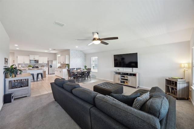 5924 Harvey Gap Ln, Denton, TX 76226 - living area with light colored carpet, ceiling fan, baseboards, recessed lighting, and light tile patterned flooring