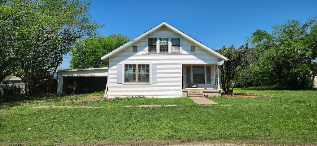 108 W Stroud St, Frost, TX 76641 - back of house with a yard