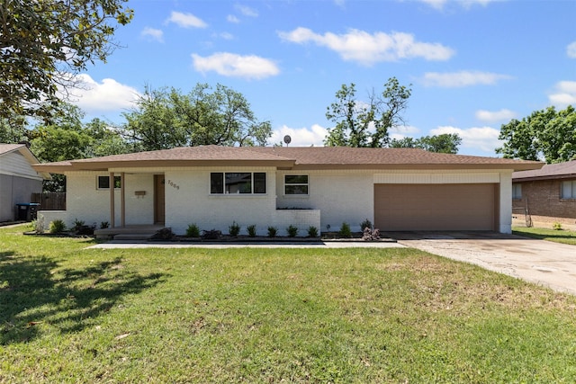 7009 Overhill Rd, Fort Worth, TX 76116 - single story home with a garage, brick siding, a front yard, and driveway