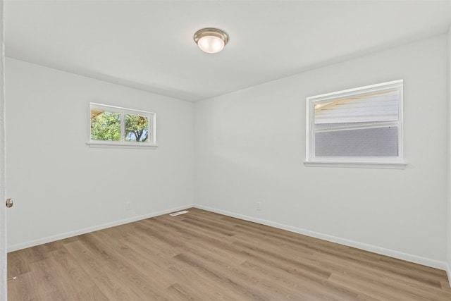 7009 Overhill Rd, Fort Worth, TX 76116 - unfurnished room featuring light wood-type flooring and baseboards