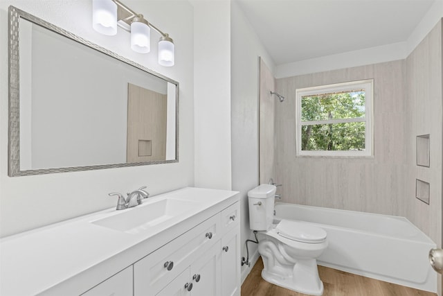 7009 Overhill Rd, Fort Worth, TX 76116 - bathroom featuring toilet, shower / bathtub combination, vanity, and wood finished floors