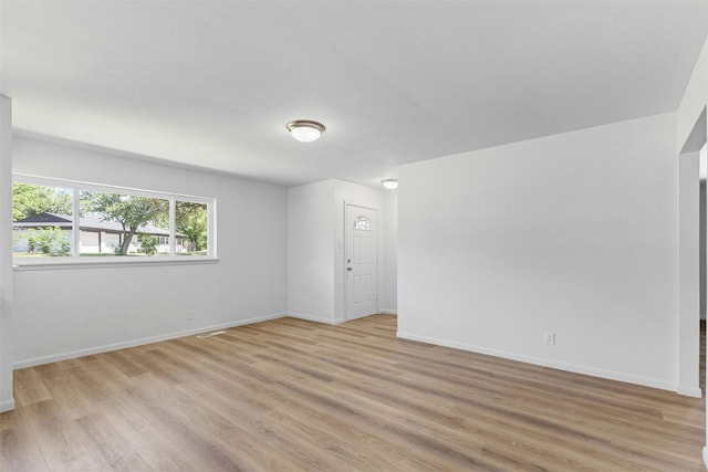7009 Overhill Rd, Fort Worth, TX 76116 - unfurnished room with light wood finished floors and baseboards