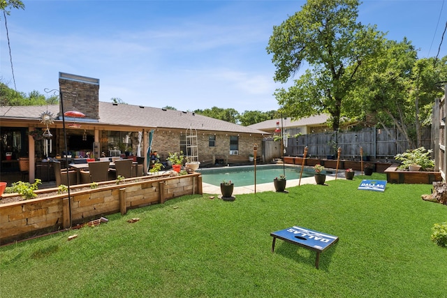 view of swimming pool with a fenced backyard, an outdoor living space, a yard, and a fenced in pool