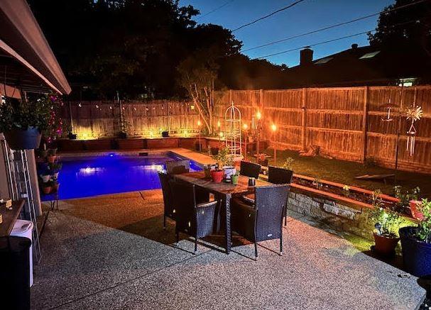 view of swimming pool with a fenced in pool, a patio area, and a fenced backyard