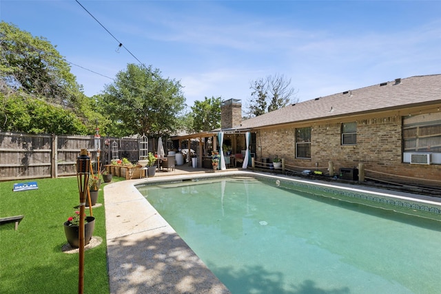 view of pool featuring cooling unit, fence, a patio area, and a fenced in pool