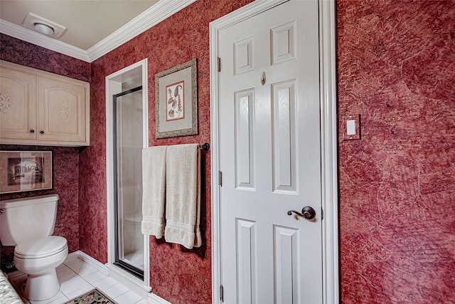 full bathroom featuring wallpapered walls, a shower stall, tile patterned flooring, toilet, and crown molding