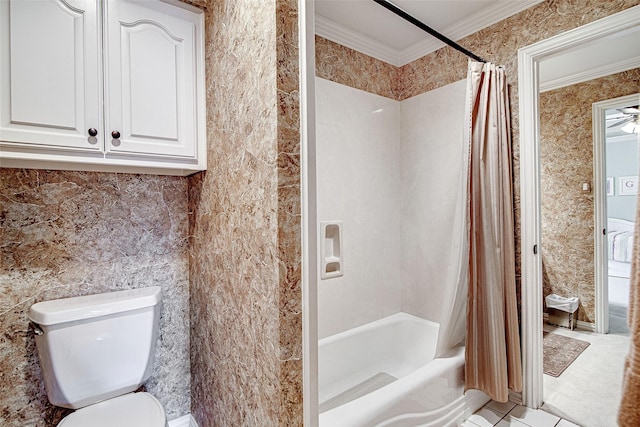 bathroom with crown molding, toilet, and shower / bathtub combination with curtain