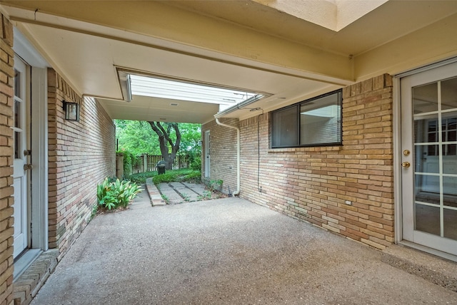 view of patio / terrace featuring fence