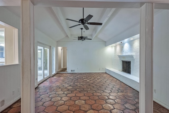 unfurnished living room featuring visible vents, a fireplace, baseboards, vaulted ceiling with beams, and a ceiling fan