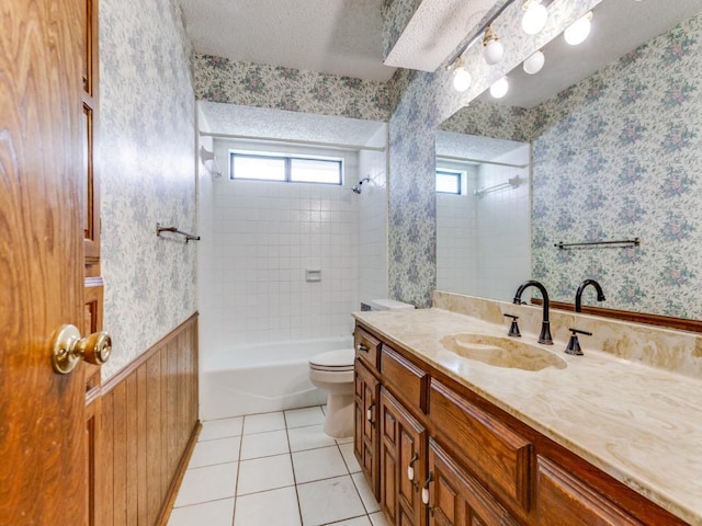 2011 Vicksburg Dr, Sachse, TX 75048 - bathroom with toilet, tile patterned flooring, vanity, and wallpapered walls