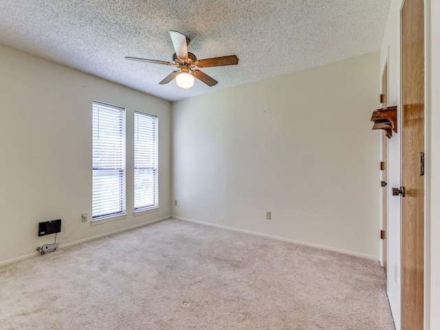 2011 Vicksburg Dr, Sachse, TX 75048 - empty room featuring carpet flooring, a textured ceiling, and ceiling fan