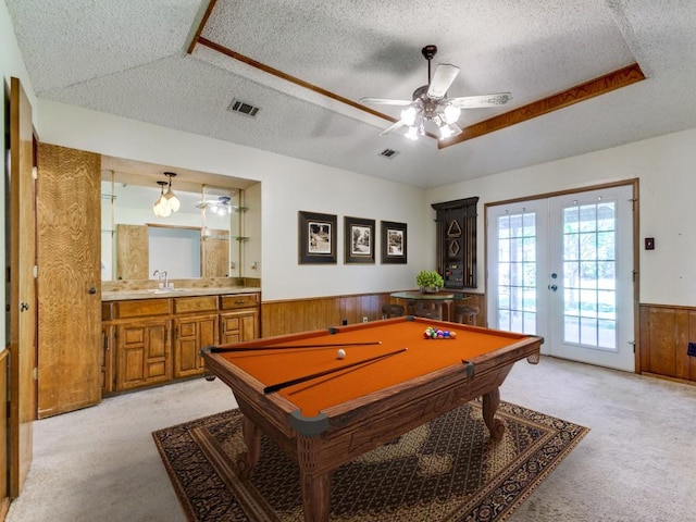 2011 Vicksburg Dr, Sachse, TX 75048 - game room with light carpet, wainscoting, visible vents, and a textured ceiling