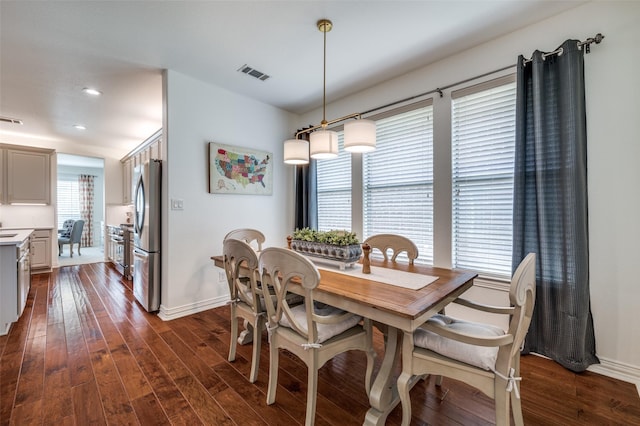12067 Sunny St, Frisco, TX 75033 - dining room with dark wood-type flooring, baseboards, and recessed lighting