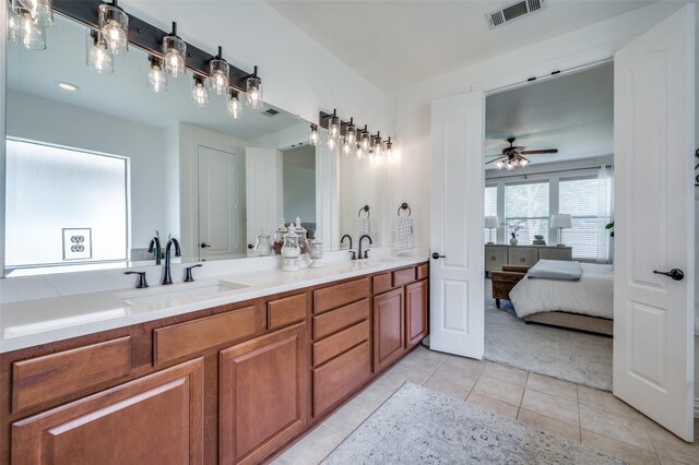 12067 Sunny St, Frisco, TX 75033 - bathroom featuring ceiling fan, tile patterned flooring, ensuite bath, and double vanity