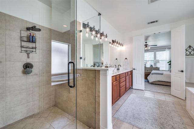12067 Sunny St, Frisco, TX 75033 - bathroom featuring ensuite bathroom, tiled shower, a ceiling fan, vanity, and tile patterned floors