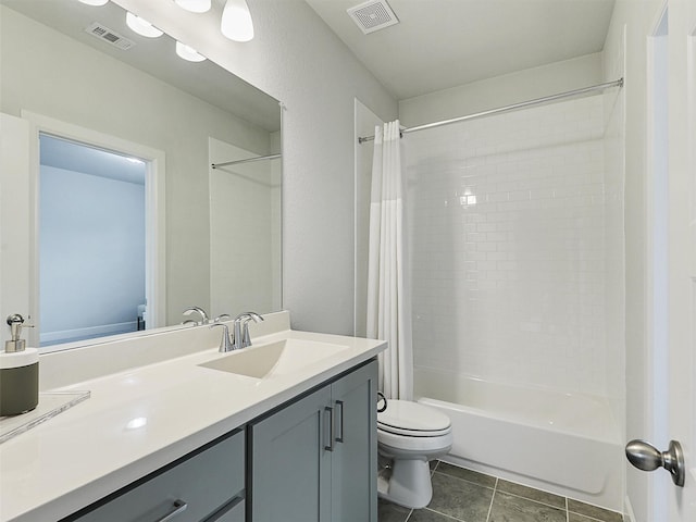 9136 Rock Daisy Ct, Dallas, TX 75231 - bathroom featuring vanity, shower / bath combo with shower curtain, and tile patterned flooring