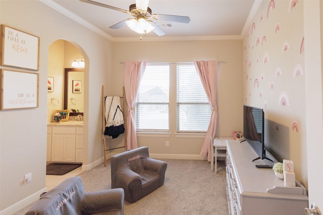 interior space with visible vents, a ceiling fan, ornamental molding, light carpet, and arched walkways