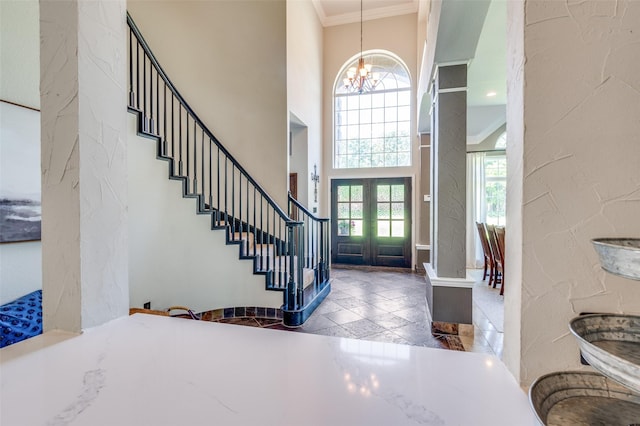 4007 Brooks Ct, Highland Village, TX 76226 - foyer entrance with crown molding, stairs, an inviting chandelier, french doors, and a high ceiling