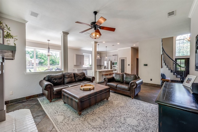 4007 Brooks Ct, Highland Village, TX 76226 - living area with plenty of natural light, a ceiling fan, baseboards, and ornamental molding