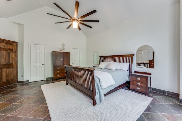 4007 Brooks Ct, Highland Village, TX 76226 - bedroom featuring stone tile flooring, baseboards, a ceiling fan, and high vaulted ceiling