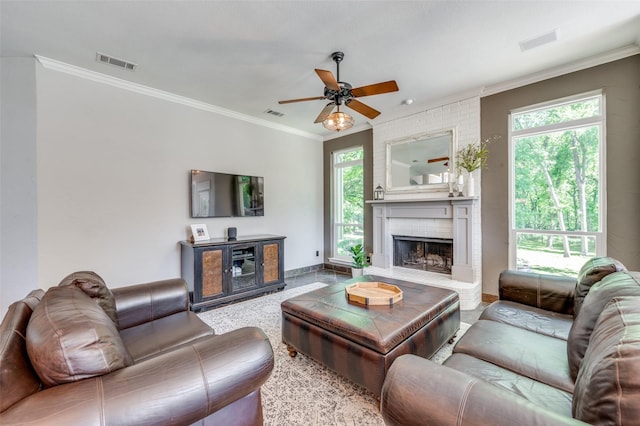 4007 Brooks Ct, Highland Village, TX 76226 - living area featuring visible vents, ceiling fan, a brick fireplace, and ornamental molding
