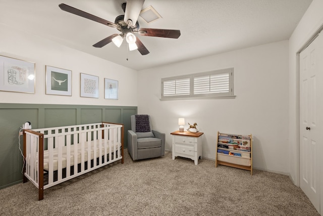 1764 Brown Trl, Hurst, TX 76054 - carpeted bedroom featuring a crib, a closet, and ceiling fan