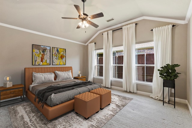 carpeted bedroom with ceiling fan, lofted ceiling, ornamental molding, and visible vents