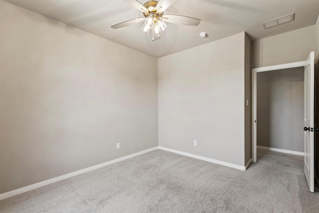 unfurnished bedroom featuring visible vents, baseboards, carpet flooring, and ceiling fan
