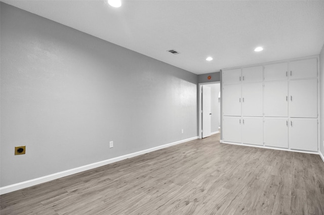 6709 Santiago Ave, Fort Worth, TX 76133 - unfurnished bedroom with recessed lighting, baseboards, and light wood-type flooring