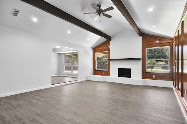 6709 Santiago Ave, Fort Worth, TX 76133 - unfurnished living room with wood finished floors, a ceiling fan, a brick fireplace, baseboards, and recessed lighting