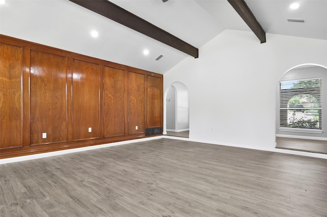 6709 Santiago Ave, Fort Worth, TX 76133 - unfurnished living room with arched walkways, wood finished floors, recessed lighting, and baseboards