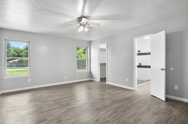 6709 Santiago Ave, Fort Worth, TX 76133 - empty room with ceiling fan, wood finished floors, and baseboards
