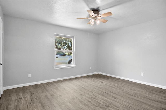 6709 Santiago Ave, Fort Worth, TX 76133 - spare room with ceiling fan, wood finished floors, and baseboards