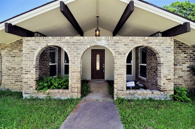 6709 Santiago Ave, Fort Worth, TX 76133 - property entrance featuring brick siding and a porch