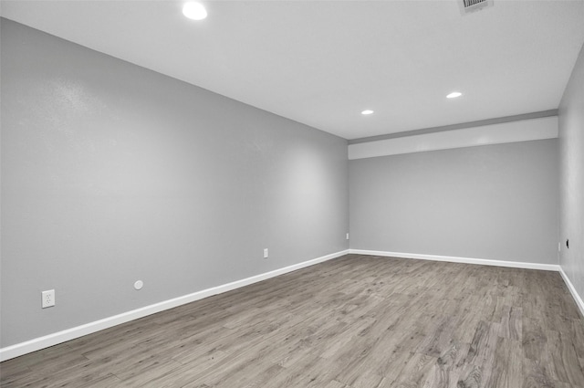 6709 Santiago Ave, Fort Worth, TX 76133 - spare room with recessed lighting, baseboards, and wood finished floors