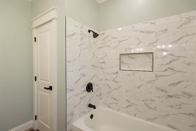 bathroom featuring washtub / shower combination