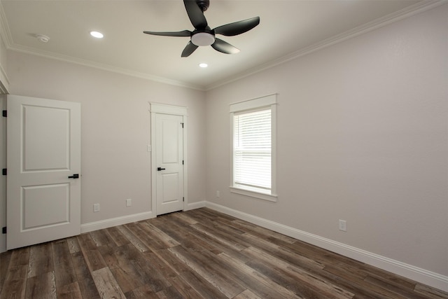 unfurnished bedroom featuring crown molding, a ceiling fan, dark wood finished floors, baseboards, and recessed lighting